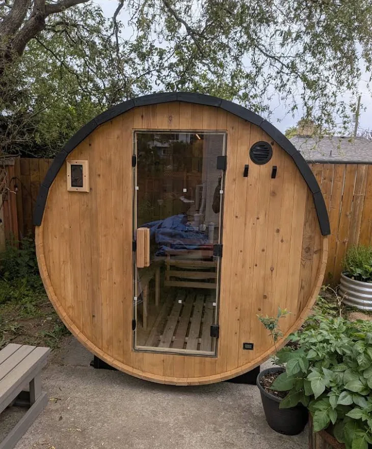 Cedar barrel sauna wired and installed in a Vancouver Island backyard